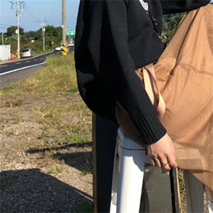 Clara | Damtröja med rund hals och ribbade muddar