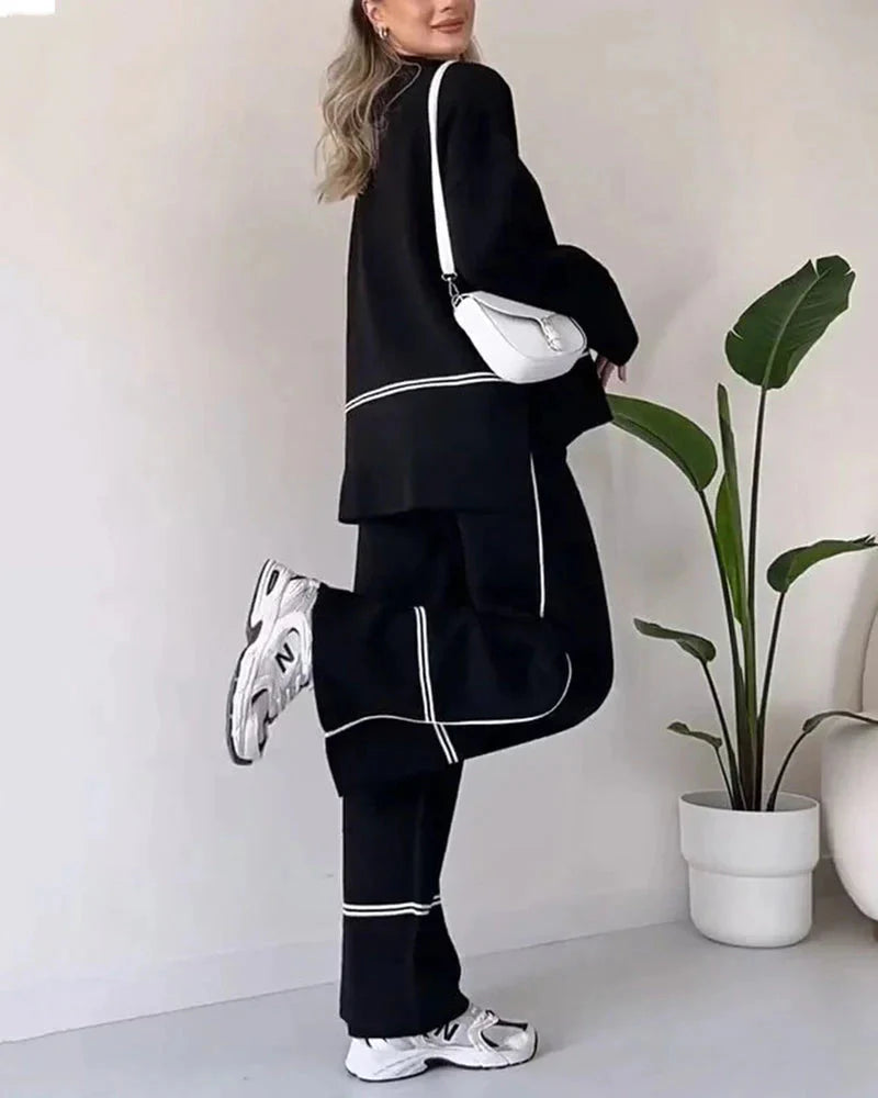 Co-Ord Set - Tvådelat set med överdimensionerad tröja och byxor med vida ben för kvinnor