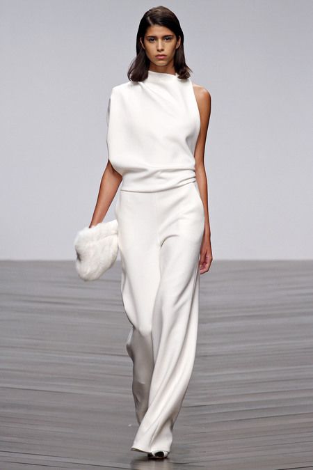 Elegant Jumpsuit – dammodell med hög hals, ärmlös och vida ben