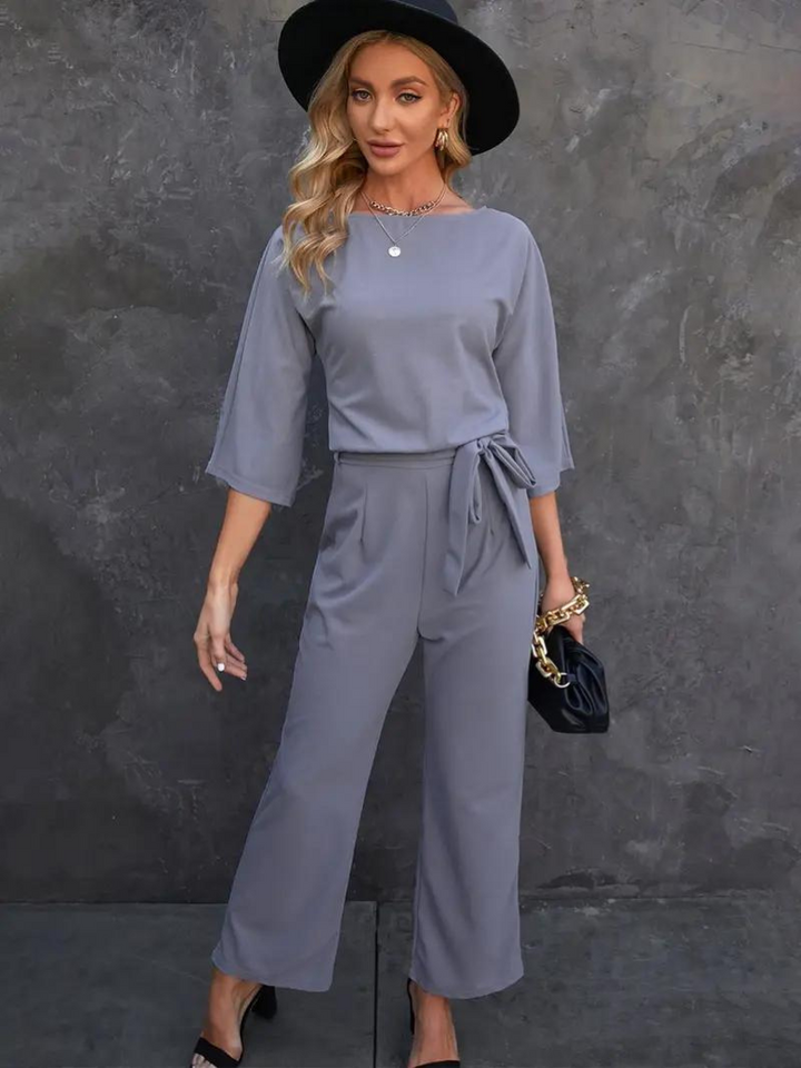 Elegant jumpsuit, skärp, dolmanärm, vid ben, damkläder