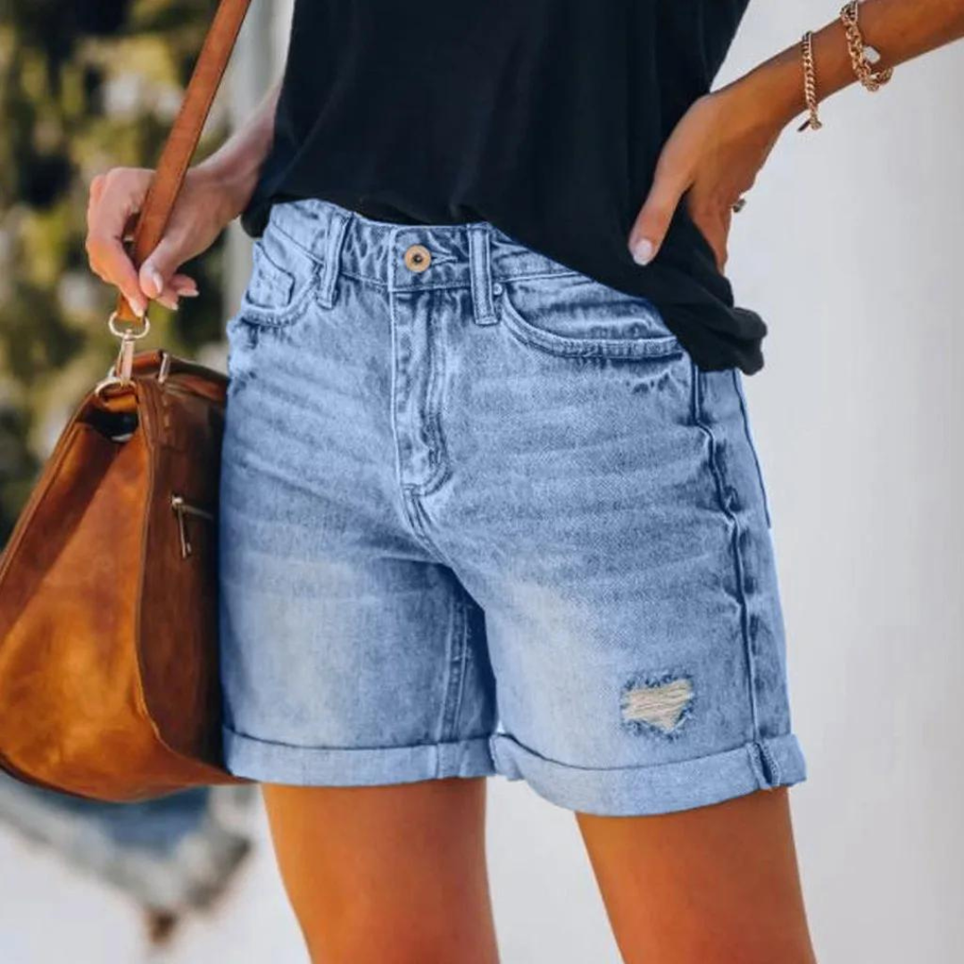 Högmidjade jeansshorts med insliten look - Molly