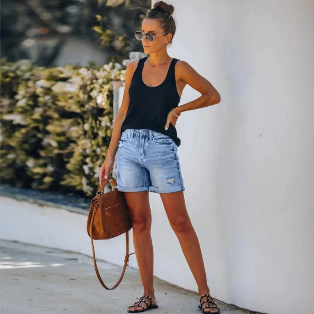 Högmidjade jeansshorts med insliten look - Molly