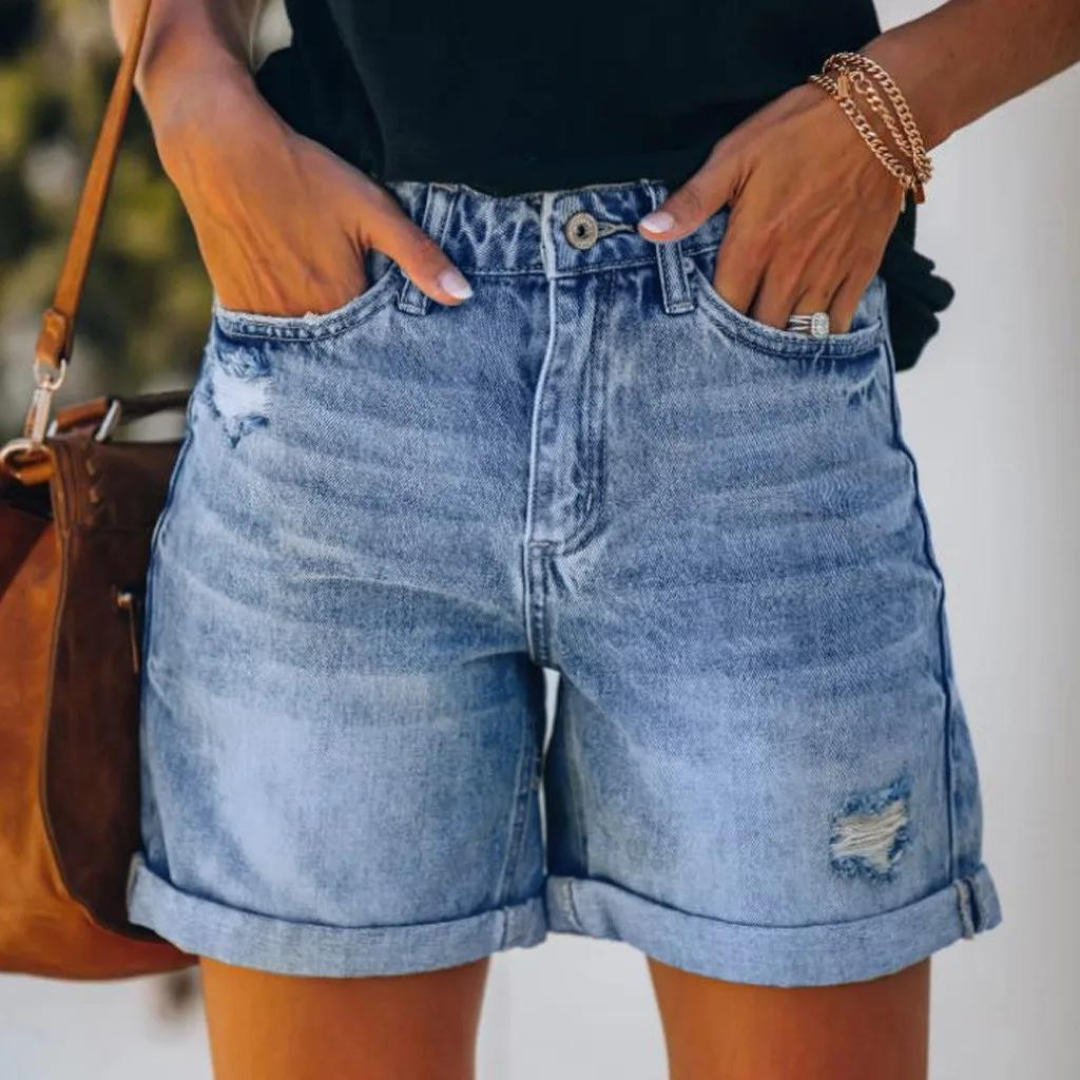Högmidjade jeansshorts med insliten look - Molly