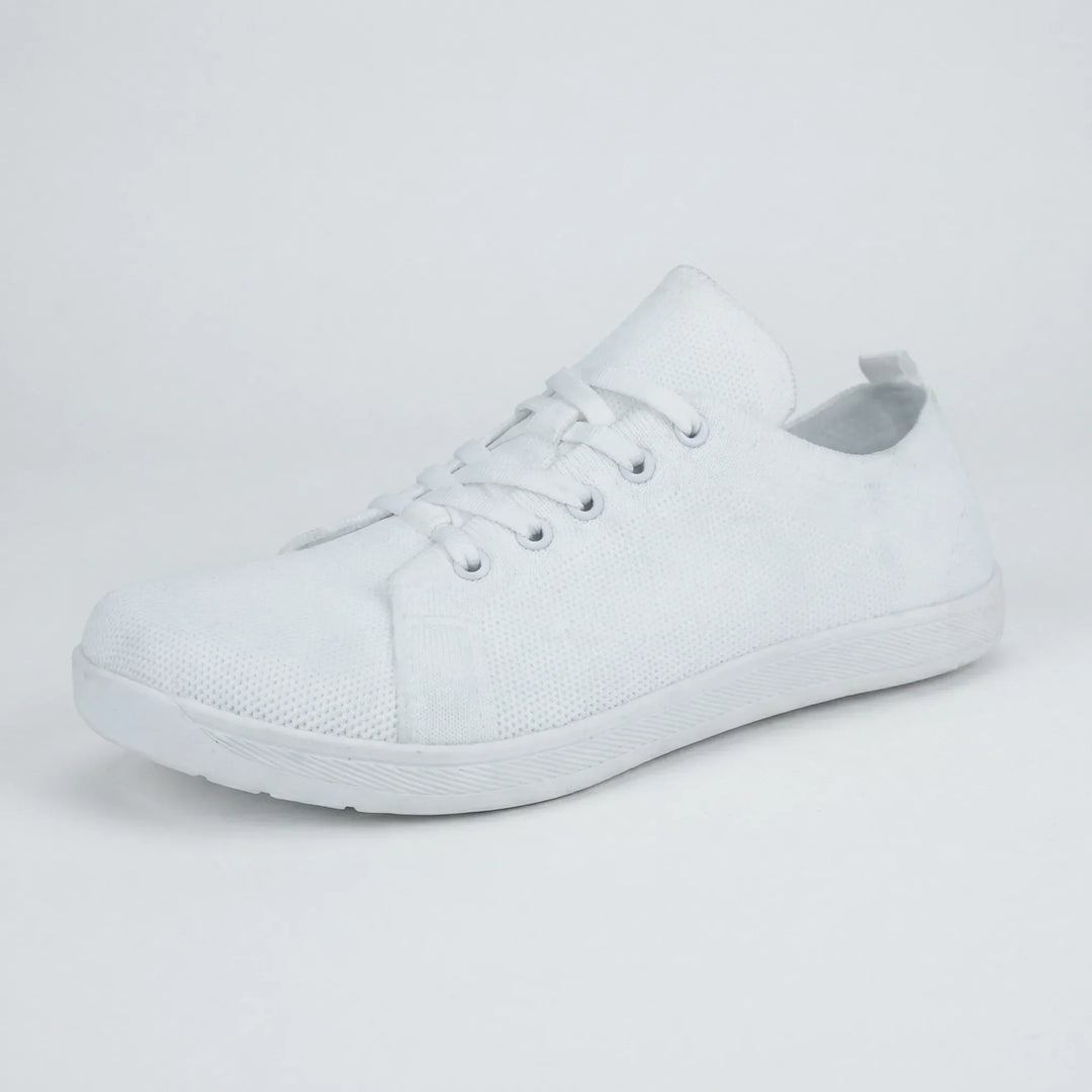 Minimalistisk barefoot-sneaker med platt sula - Clark