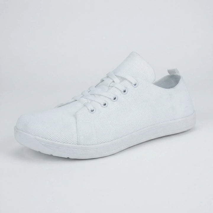 Minimalistisk barefoot-sneaker med platt sula - Clark