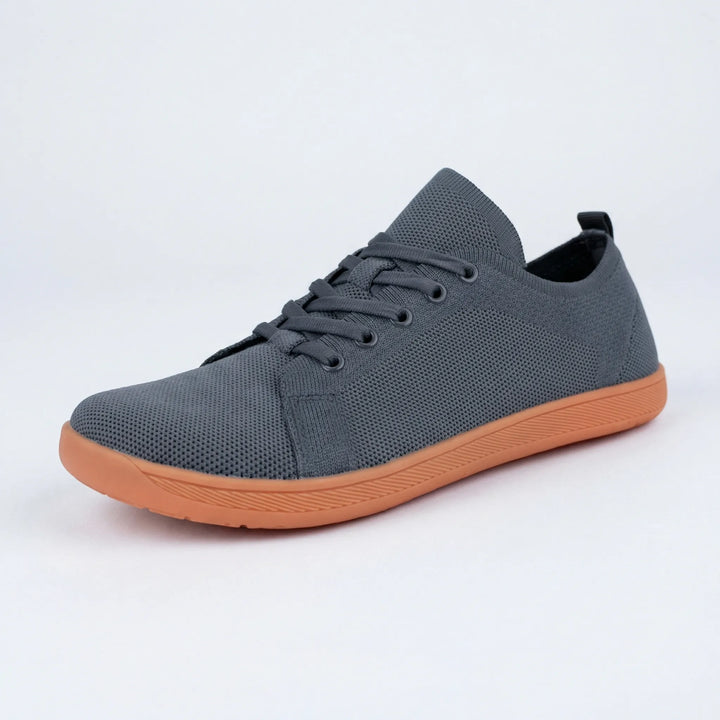 Minimalistisk barefoot-sneaker med platt sula - Clark