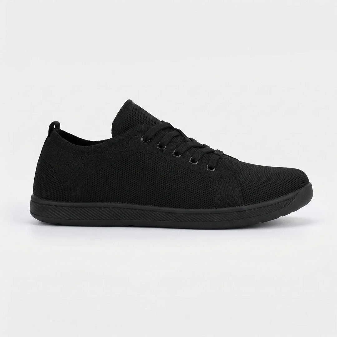 Minimalistisk barefoot-sneaker med platt sula - Clark