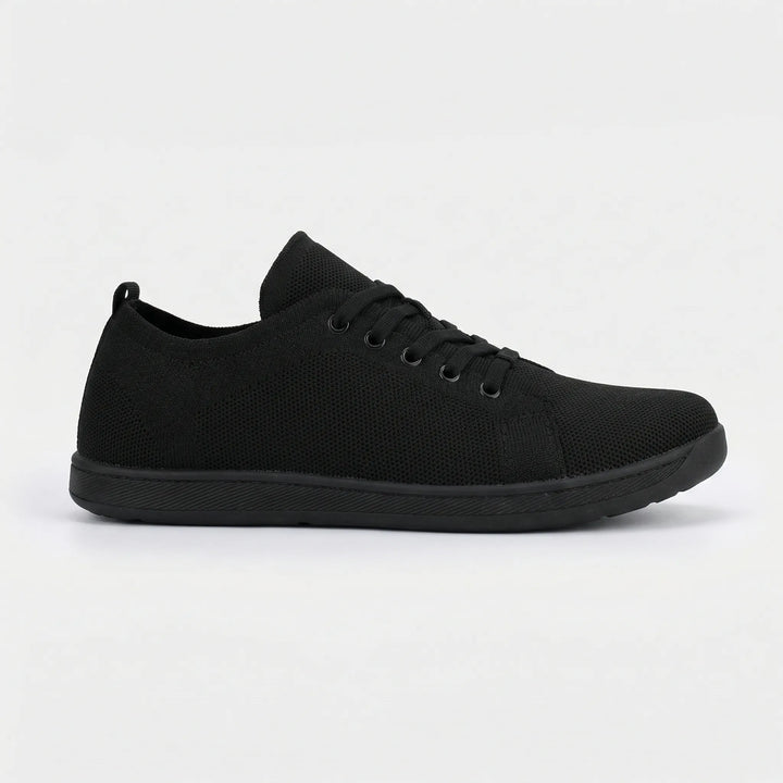 Minimalistisk barefoot-sneaker med platt sula - Clark