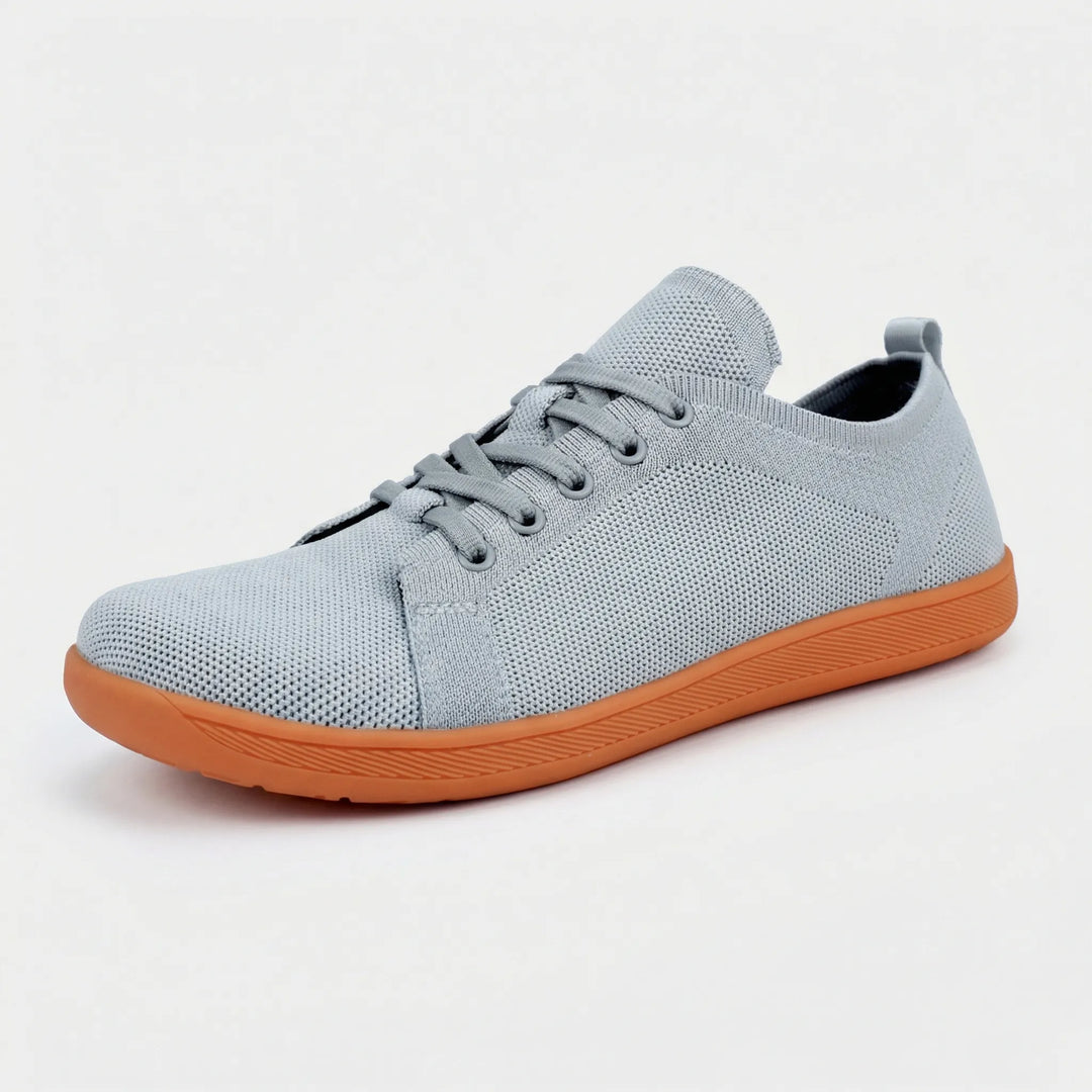 Minimalistisk barefoot-sneaker med platt sula - Clark