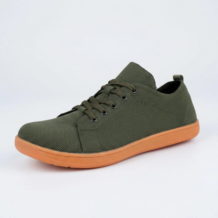 Minimalistisk barefoot-sneaker med platt sula - Clark