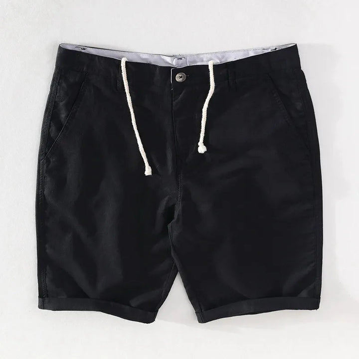 Strandshorts för herr i linne-bomull, sommarlook med knappstängning - Sandro