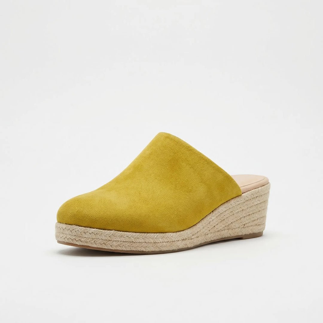 Slip-on-mule med kilklack och rund tå - Mary