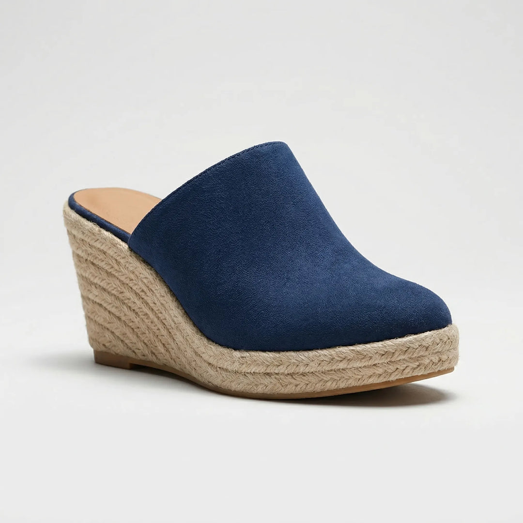 Slip-on-mule med kilklack och rund tå - Mary