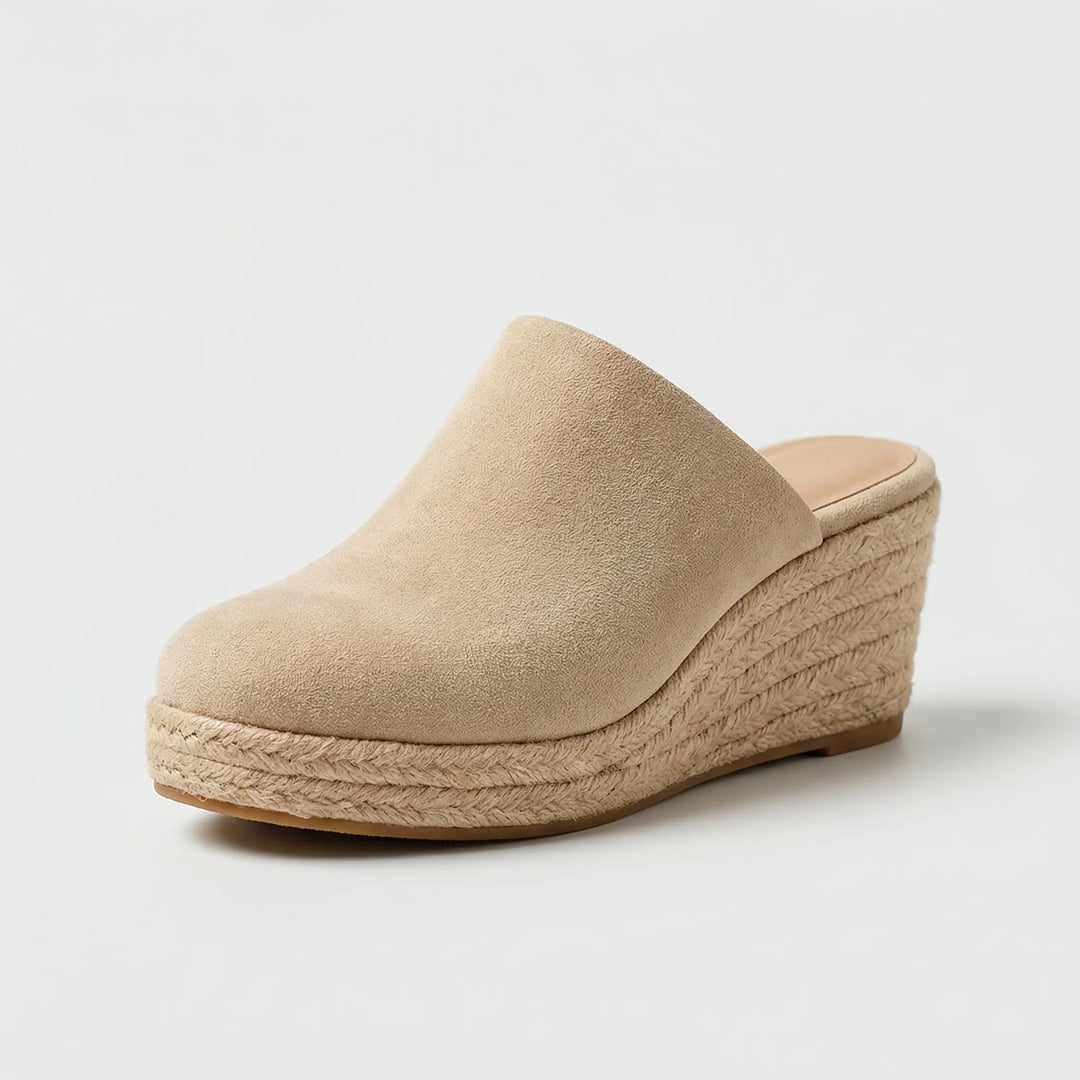 Slip-on-mule med kilklack och rund tå - Mary