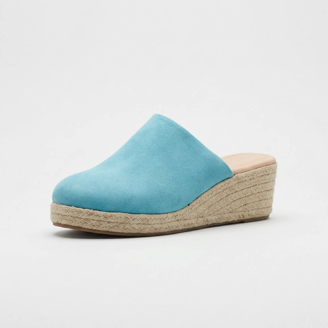 Slip-on-mule med kilklack och rund tå - Mary